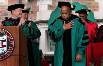 John Lewis bows his head to receive honorary degree